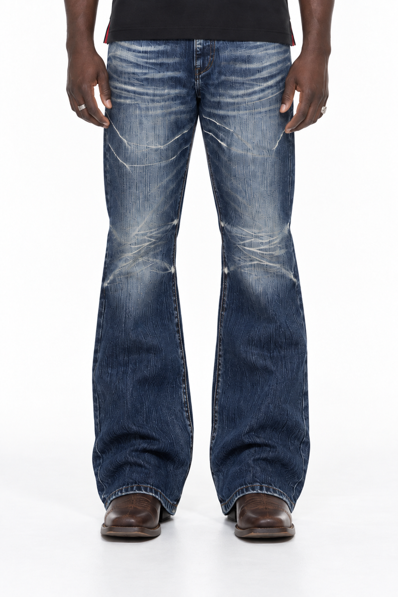 FINELLI Bootcut Denim Pants Deep Blue Tint – close view of the denim wash, flared hems and brown Ariat boots