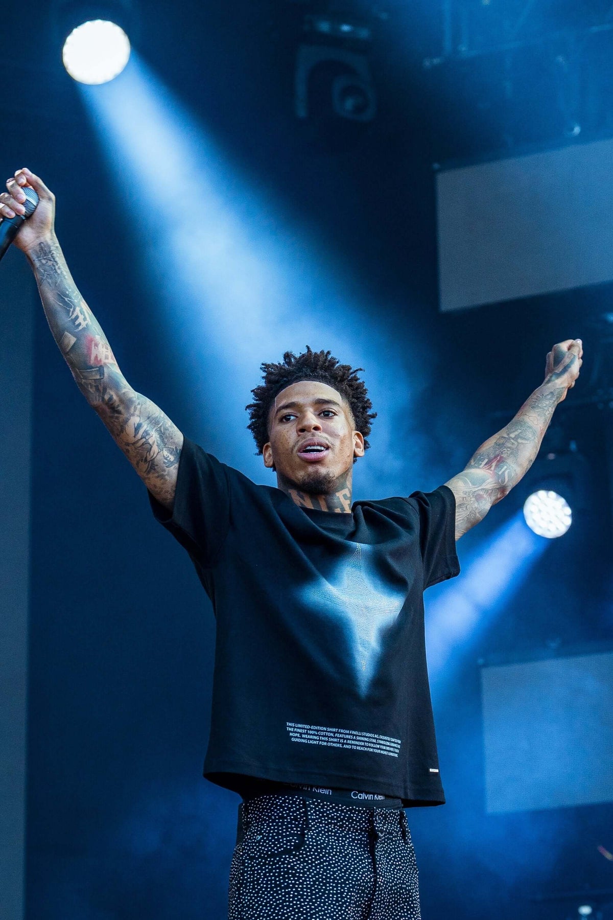 NLE Choppa wearing the FINELLI Star T-Shirt on stage
